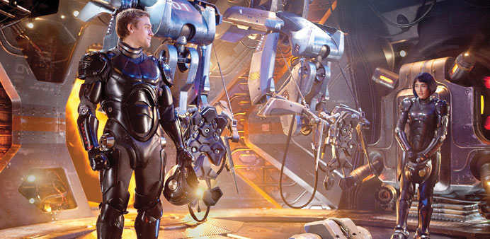  Charlie Hunnam (left) and Rinko Kikuchi star in Pacific Rim.