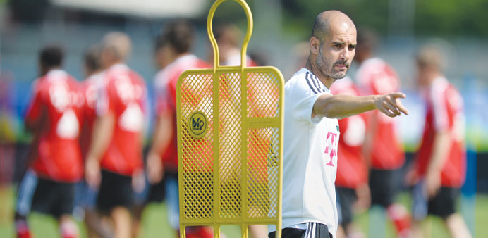 Bayern Munichu2019s Spanish head coach Pep Guardiola gestures during a training session in Arco, Italy, yesterday. (AFP)
