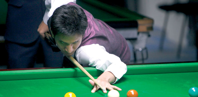 India's Laxman Singh Rawat (top) will take on Pakistan's Mohamed Asif (below) in the semi-finals of the Asian Snooker 6-Red Championship at the Qatar 