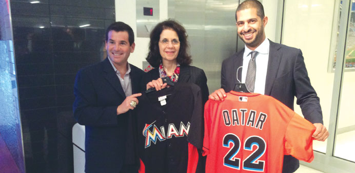 Ziadeh, centre, is seen with al-Khater, right, and Miami Marlins president David Samson.