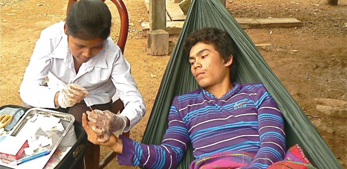 Village health workers in western Cambodia are on the frontlines of fighting malaria.