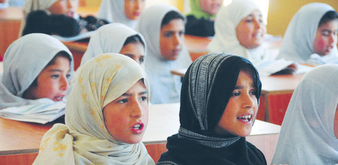    Afghan girls take classes at a refugee school in Afghanistanu2019s Parwan province. Angelina Jolie, a goodwill ambassador for the UNHCR, funded this sc