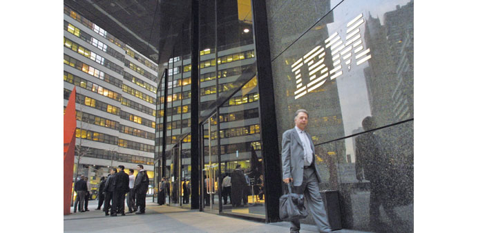 A pedestrian walks past the IBM building in Manhattan. IBM is concerned about a possible attack by prominent activist hedge funds, and is working with