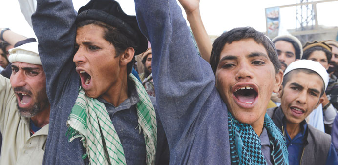 Afghans shout slogans as they condemn the July 15 suicide attack in Urgun district, Paktika province yesterday.