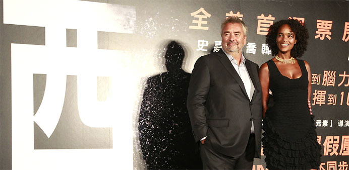 French film director Luc Besson (L) and his wife, producer Virginie Silla