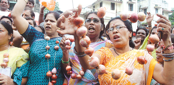 Activists of the Bharatiya Janata Party protest against the spiralling prices of onions in Bhopal.