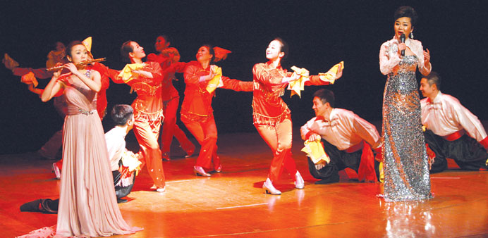 A  singer presents a folk song as dancers perform in the background. PICTURES: Jayaram.