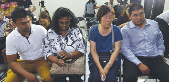 File photo shows the kin of Australian death row prisoners, Myuran Sukumaran and Andrew Chan wait before a meeting at the Indonesian Human Rights Comm