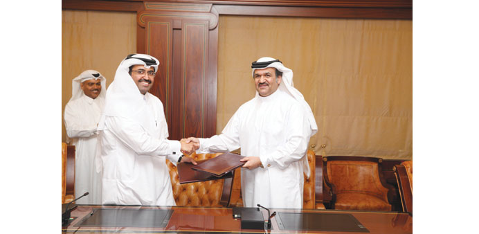 HE al-Sada with al-Othman following the conclusion of the QR5.2bn contracts GDI signed with QP for the provision of onshore and offshore rigs.