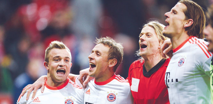 Bayern Munichu2019s Xherdan Shaqiri, Rafinha, Anatoliy Tymoshchuk and Daniel van Buyten celebrate their win against Bayer Leverkusen in Leverkusen on Satu