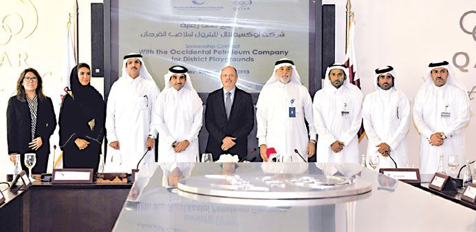 Oxy Qatar and QOC officials present at the signing ceremony.