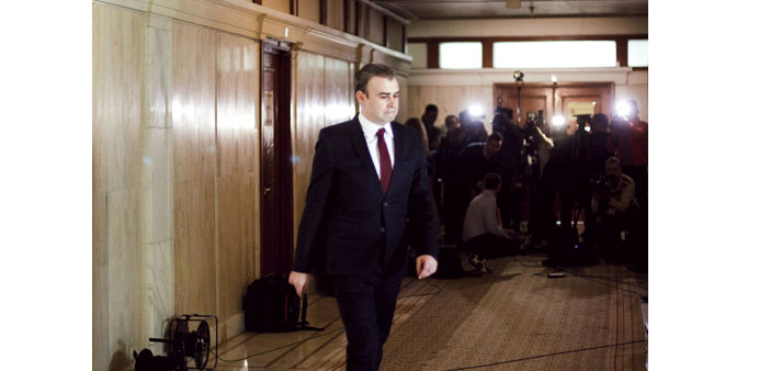Romaniau2019s former finance minister Darius Valcov arrives at the Senate in Bucharest late on Tuesday.