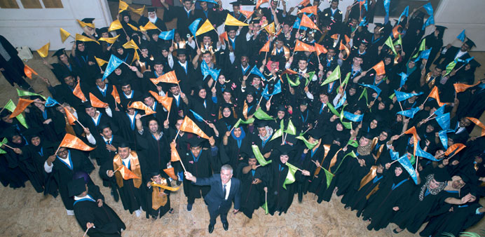 The graduating class along with Dr Ken MacLeod during a ceremony.