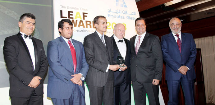 Sheikh Dr Khaled bin Thani al-Thani (third left) receiving the award at a ceremony held in London. Sheikh Turki bin Khaled bin Thani al-Thani is seen 
