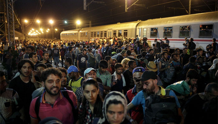 Migrants leave after failing to board a train at the train station in Tovarnik, Croatia. AFP