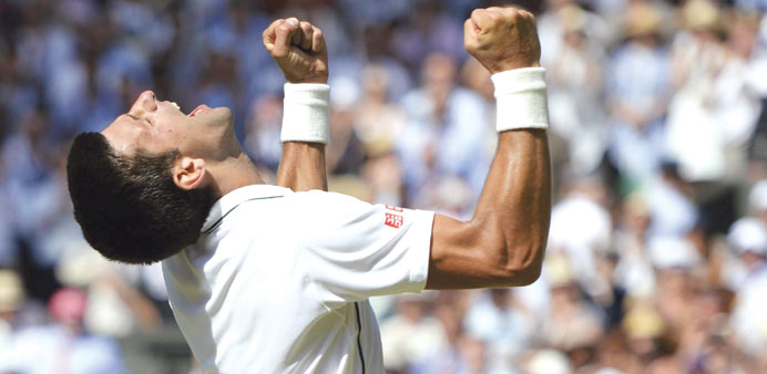 Novak Djokovic of Serbia celebrates defeating Grigor Dimitrov of Bulgaria in their Wimbledon semi-final in London yesterday. (Reuters)