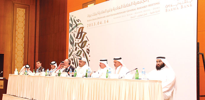 Barwa Bank board addressing the extra-ordinary general assembly yesterday.