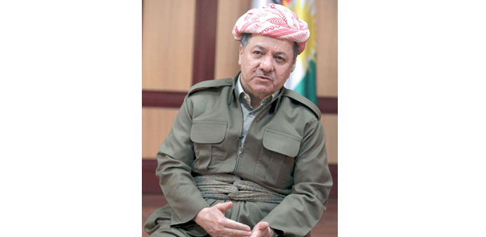 Barzani speaks during the interview with Reuters.