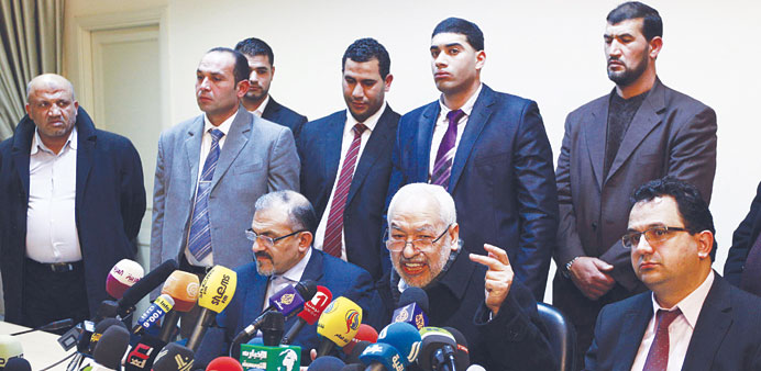 Ennahda leader Rached Ghannouchi speaks at a news conference in Tunis yesterday.