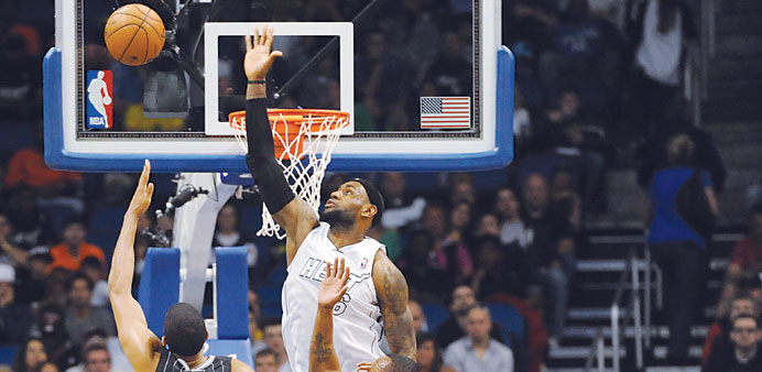 LeBron James (6) of the Miami Heat blocks the ball from Tobias Harris (12) of the Orlando Magic during their NBA game at Amway Center in Orlando on Mo