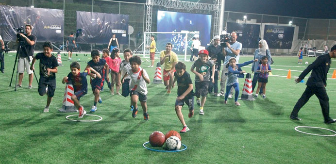 Children participating in a football event held recently.