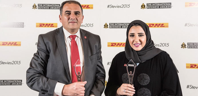Officials with some of the awards won by Ooredoo at the ceremony in Toronto, Canada.