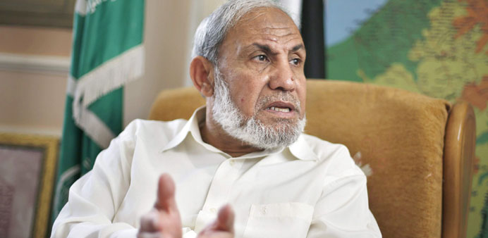 Zahar gestures during an interview in Gaza City yesterday.