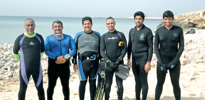 QP divers preparing to lift tyres to the surface
