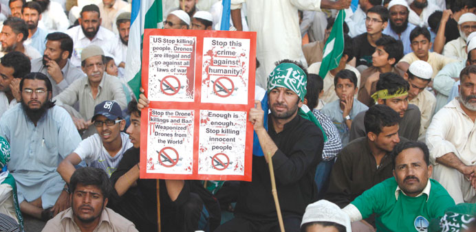 Supporters of Pakistani religious party Jamaat-e-Islami (JI) and the Pakistan Tehreek-e-Insaf (PTI) political party of former cricket star Imran Khan,
