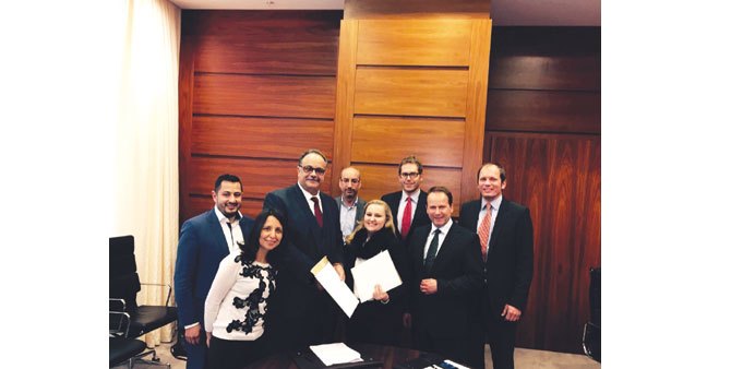  Aamal and ECE Projektmanagement officials after signing the joint venture agreement.