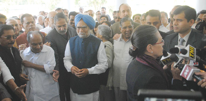 Congress chief Sonia Gandhi speaks to journalists at the home of former prime minister Manmohan Singh yesterday.