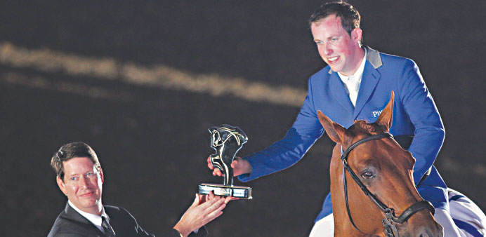 Dutch rider Gerco Schroder aboard London after his win in the CHI Al Shaqab CSI 5* Grand Prix at the Al Shaqab Arena in Doha yesterday. 