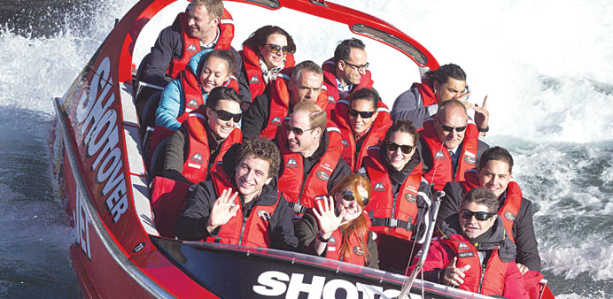 Britainu2019s Prince William and his wife Catherine, the Duchess of Cambridge, take a ride on the u2018Shotover Jetu2019 in the New Zealand city of Queenstown yes