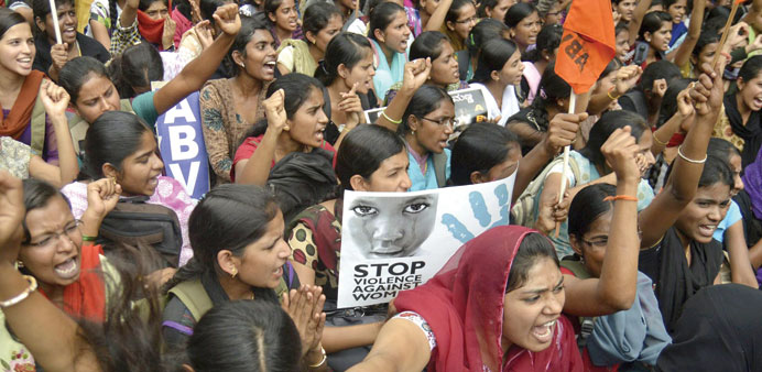 Activists from student organisation Akhil Bharatiya Vidyarthi Parishad shout slogans during a protest against the alleged sexual assault of a 6-year-o
