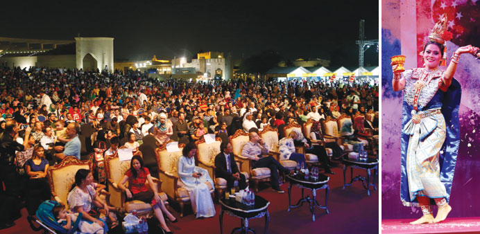  A view of the audience at the Asean festival at Katara yesterday. Right: Performers stage a group dance.  A dancer performs at the festival. PICTURES