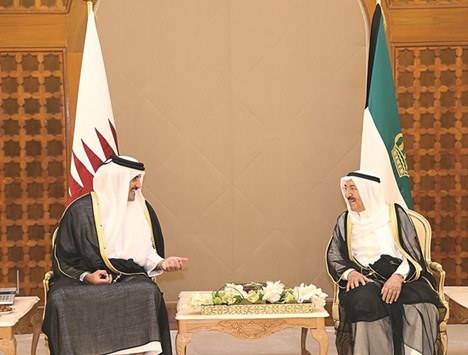 HH the Emir Sheikh Tamim bin Hamad al-Thani meeting with the Emir of Kuwait Sheikh Sabah al-Ahmed al-Jaber al-Sabah in Kuwait City yesterday.