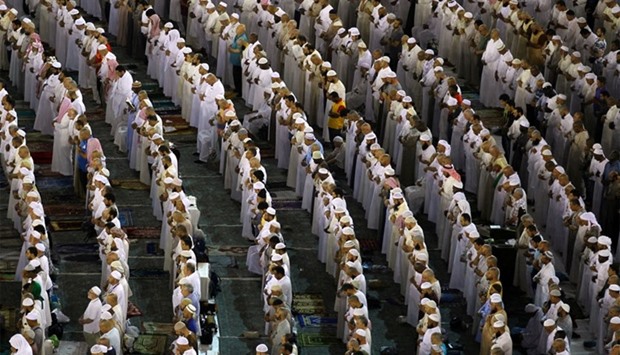 Devotees pray at the Grand Mosque during the holy fasting month of Ramadan in Makkah