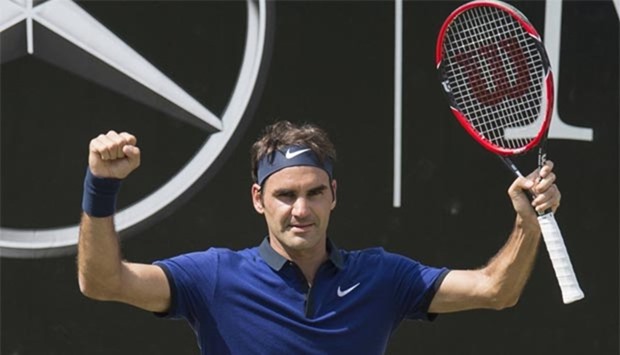 Roger Federer celebrates after defeating Germany's Florian Mayer in their quarterfinal match at the ATP Mercedes Cup tournament in Stuttgart on Friday.