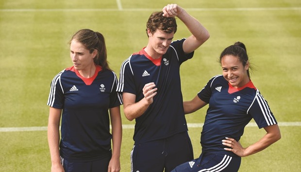 Jamie Murray, Johanna Konta and Heather Watson strike a pose after being named in Great Britain team for the Olympics yesterday. (Reuters)