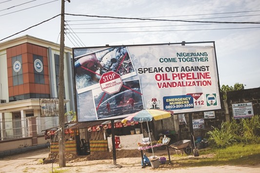 An advertising board concerning the oil pipeline vandaliSation in the City of Warri in Delta State yesterday.