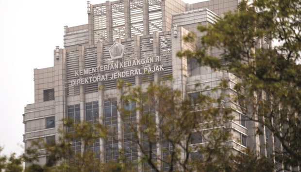 The headquarters of Indonesiau2019s tax office in Jakarta. A planned tax amnesty is likely to generate an additional tax revenue of 53.4tn rupiah, a top official of monetary policy at the central bank, said yesterday.