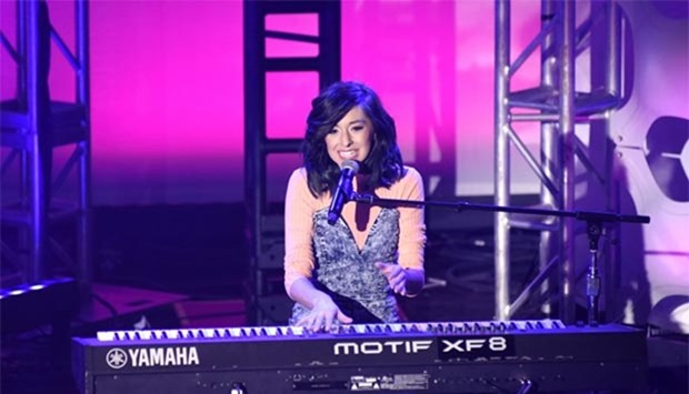 Singer Christina Grimmie performing at What's Trending's Fourth Annual Tubeathon Benefitting the American Red Cross on April 20 this year in Burbank.