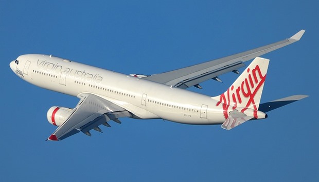 HNA Group, the owner of Hainan Airlines, said it plans to acquire 13% of Virgin Australia and struck a code-share alliance with the Brisbane-based airline.