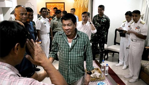 Rodrigo Duterte meets his National Security officials in Davao City, southern island of Mindanao, on Wednesday.