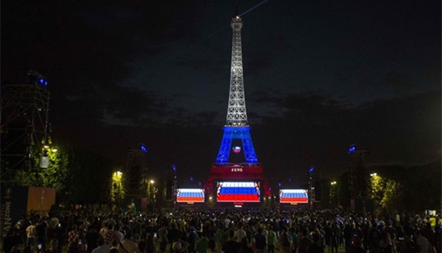 Euro 2016 football match between England and Russia in front of the lighted Eiffel Tower in Paris