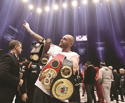 In this November 28, 2015, picture, Tyson Fury celebrates his win over Wladimir Klitschko in Dusseldorf, Germany. (Reuters)