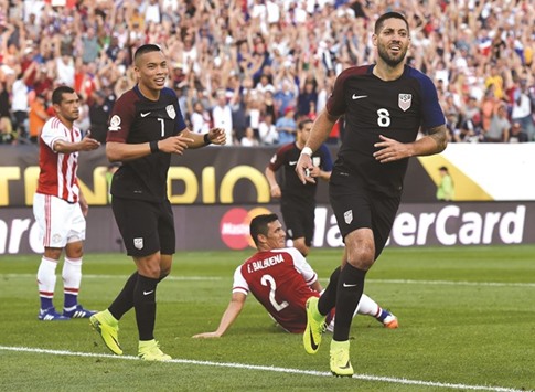 USAu2019s Clint Dempsey (right) celebrates after scoring against Paraguay during their Copa America Centenario clash on Saturday. (AFP)