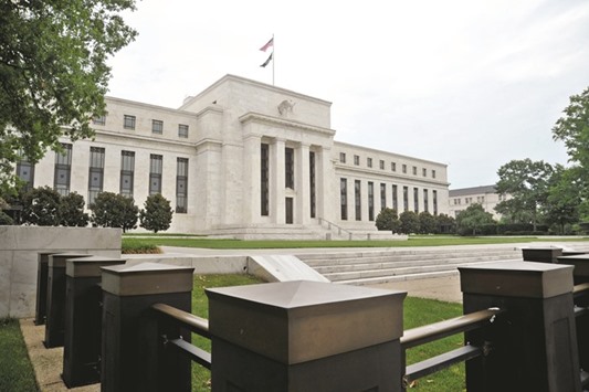 The US Federal Reserve building in Washington, DC. Analysts say the dismal May jobs report released on June 3, the worst in almost six years, and still-weak inflation will stay the hand of the Federal Open Market Committee, despite strong expectations just three weeks ago that a hike was coming this month or next.