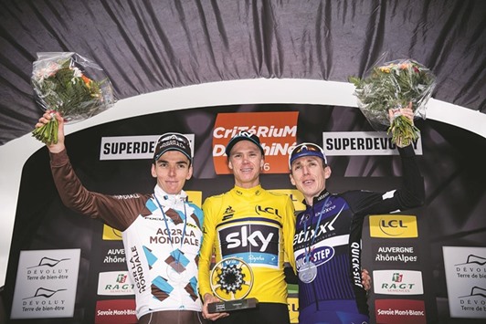 (From left) AG2R La Mondialeu2019s French Romain Bardet, Skyu2019s English rider Christopher Froome and Etixx Quick Stepu2019s Irish rider Daniel Martin celebrate on the podium after the eighth and last stage of the 68th edition of the Dauphine Criterium cycling race in Superdevoluy. (AFP)