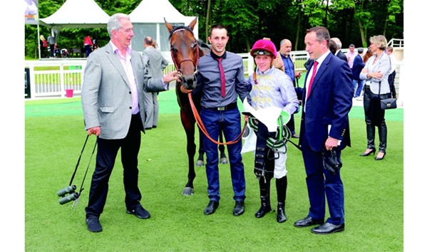 Trainer Jean Claude Rouget and jockey Gregory Benoist pose with Al Shaqab Racingu2019s Zelzal after the win in the Prix Paul de Moussac (Gr3) in Chantilly, France, on Saturday (Scoopdyga)